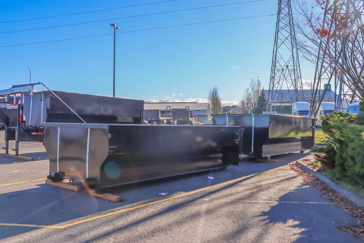 Roll-off dumpster ready for waste disposal at job site for 6 Yard Dumpster Rental in Douglasville